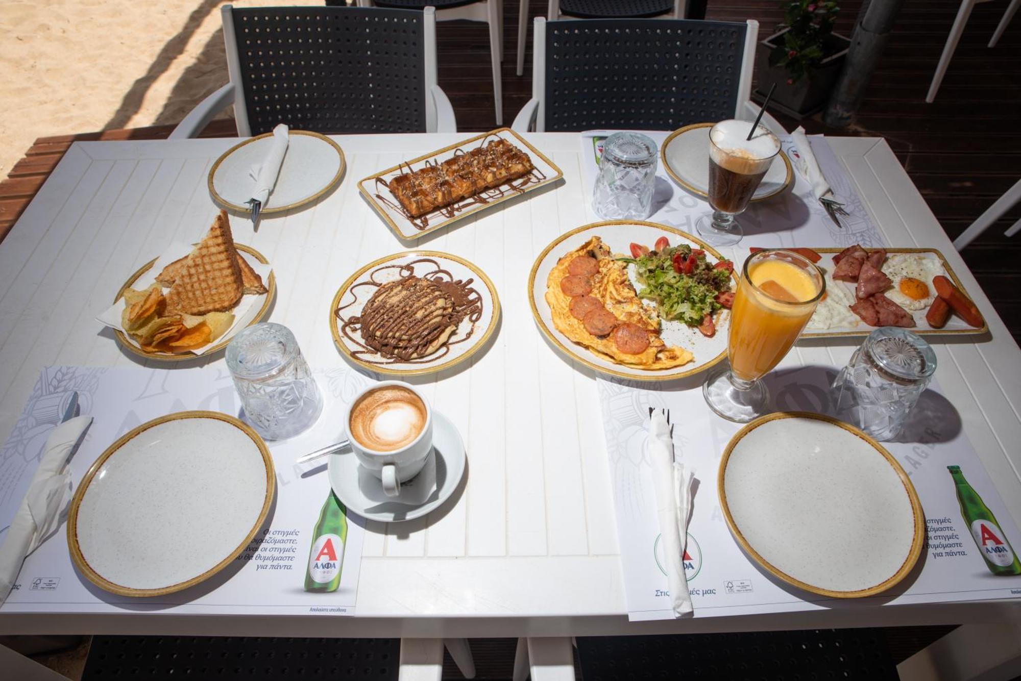 אלפוניסוס Coralli Rooms & Restaurant מראה חיצוני תמונה